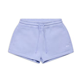 The 6PM WMNS SHORTS SOFT VIOLET feature an elastic waistband, drawstring ties, and side pockets. Displayed on a white background, these light purple shorts have a simple casual design with a small logo on the left leg.
