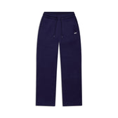 WMNS OPEN LEG ORBIT BLUE sweatpants by 6PM in navy feature an elastic waistband, drawstring, straight legs, subtle seam details, and a small white logo on the left hip. Shown against a white background.