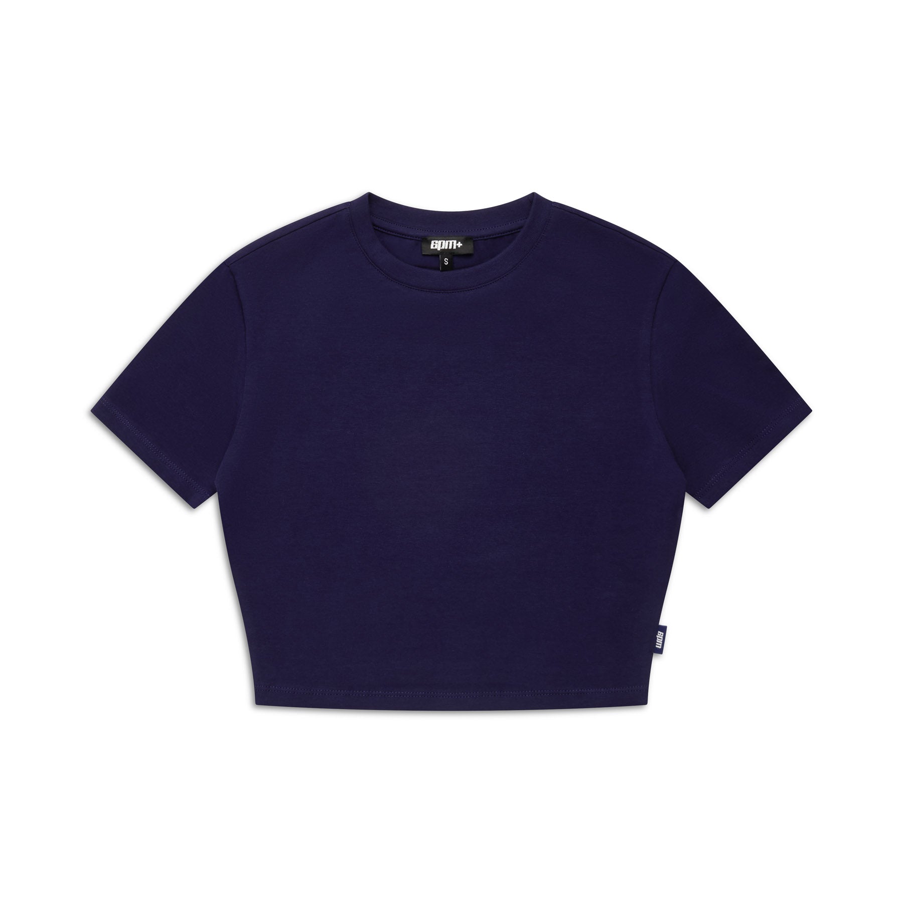 The 6PM WMNS CROPPED T-SHIRT ORBIT BLUE, a plain, short-sleeved tee with a round neck and small left side seam tag, is shown laid flat on a white background.