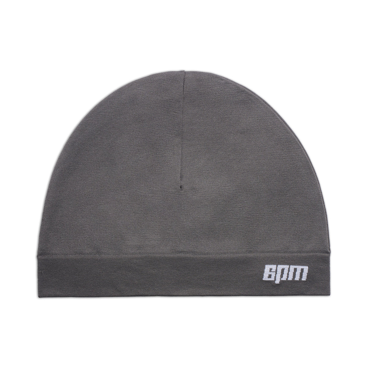 The TECHNICAL LOGO BEANIE ANTHRACITE by 6PM is a plain gray beanie featuring a small white embroidered 6PM logo on the lower right of the folded brim, shown against a white background.