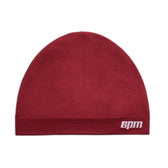 The TECHNICAL LOGO BEANIE WINE RED by 6PM features a folded brim and a white embroidered 6PM logo on the lower right side.
