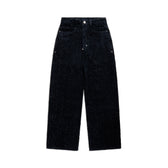 The 6PM NEEDLEPUNCH DENIM X-TRA WIDE jeans are high-waisted, wide-leg black denim with a subtle speckled pattern, shown laid flat on a white background.