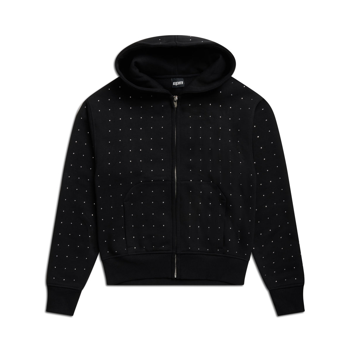 The 6PM RHINESTONE LETTER ZIP HOODIE BLACK is a black zip-up hoodie with a hood and front pockets, adorned with small silver studs on the front and sleeves, shown laid flat on a white background.