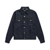 The TYPE 6 DENIM JACKET BLUE RAW by 6PM is a dark blue denim jacket with a collar, button-down front, two chest flap pockets, long sleeves, contrast stitching, and silver buttons.