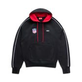 The 6PM NFL PIPING HOODIE features white piping on the sleeves, a red hood lining and drawstrings, an NFL logo patch on the left chest, and small white “8PM” text on the right chest.