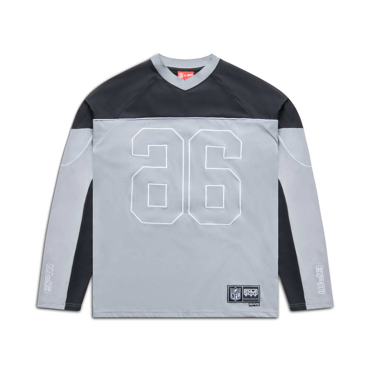 The 6PM NFL SCUBA LONGSLEEVE GREY features a color-block gray and black design, number 86 outlined on the front, plus small patches and text on the lower left hem and sleeves.