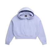 The 6PM WMNS CROPPED HOODIE SOFT VIOLET is a light purple cropped hoodie with front pocket, drawstrings, and a small white logo on the left chest, shown laid flat on a white background.