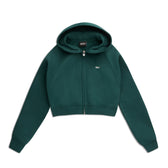 The 6PM WMNS Cropped Zip Hoodie Evergreen features a dark green color, long sleeves, front pockets, a small left chest logo, and is shown laid flat on a white background.