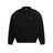 The 6PM POLO BLACK is a plain black long-sleeve polo shirt with a collar, three buttons, ribbed cuffs, and a small white logo on the left chest, shown against a white background.