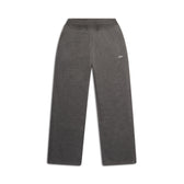 The 6PM OPEN LEG JOGGER in dark grey melange features a wide-leg design, elastic waistband, two side pockets, and a small white logo on the upper left side, shown flat on a white background.