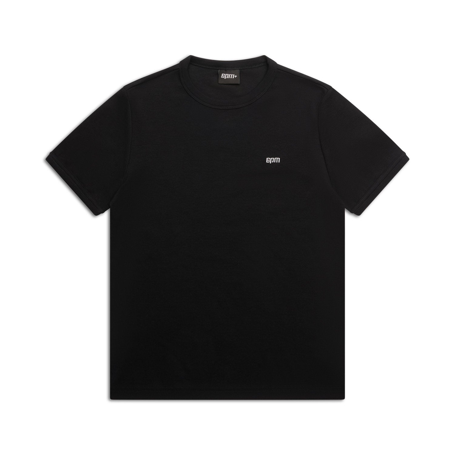 The RIBBED SLIM FIT TEE BLACK by 6PM is a plain black slim-fit short-sleeve t-shirt with a small white logo on the left chest, shown on a white background.