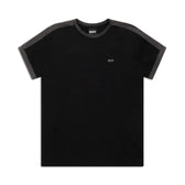 The 6PM SLIM FIT RINGER TEE BLACK is a black short-sleeve t-shirt with dark gray shoulder and sleeve cuff trim, featuring a small white epm logo on the left chest. The tee is shown laid flat on a white background.